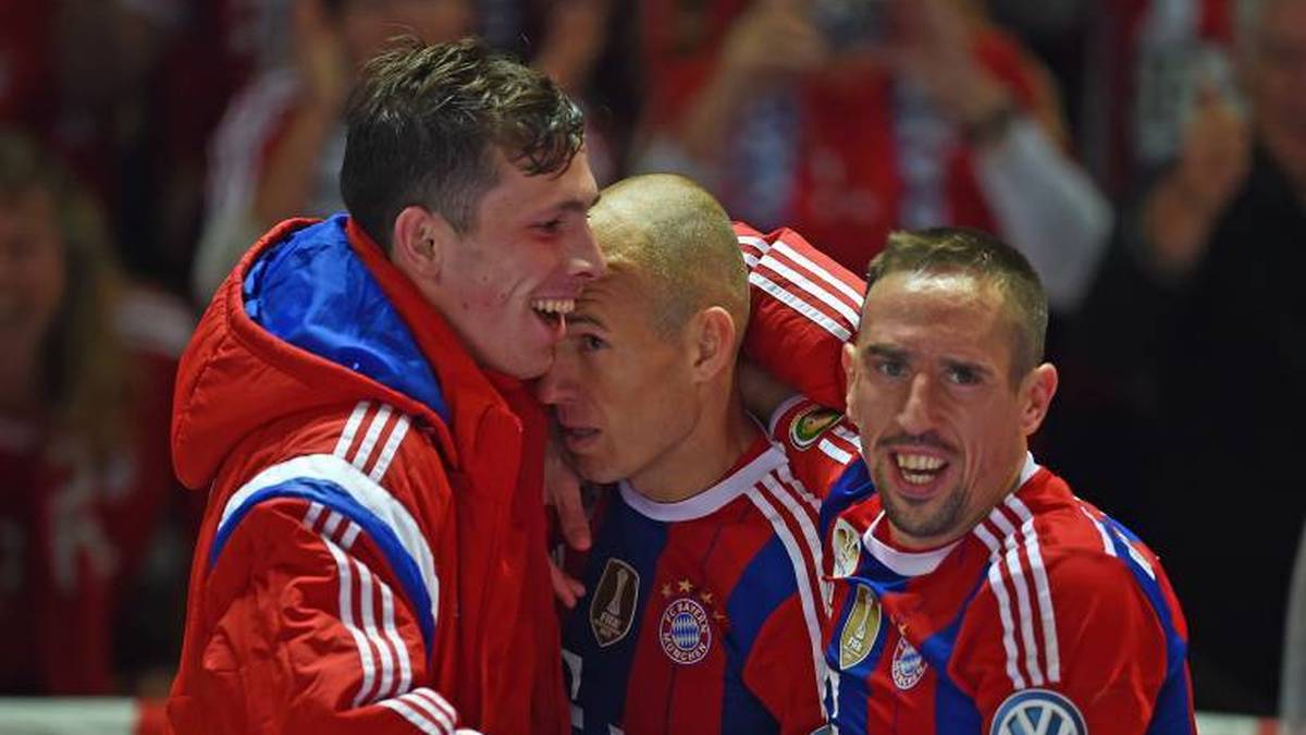 Arjen Robben (m.) und Franck Ribéry (r.) hatten maßgeblichen Anteil am Erfolg des FC Bayern