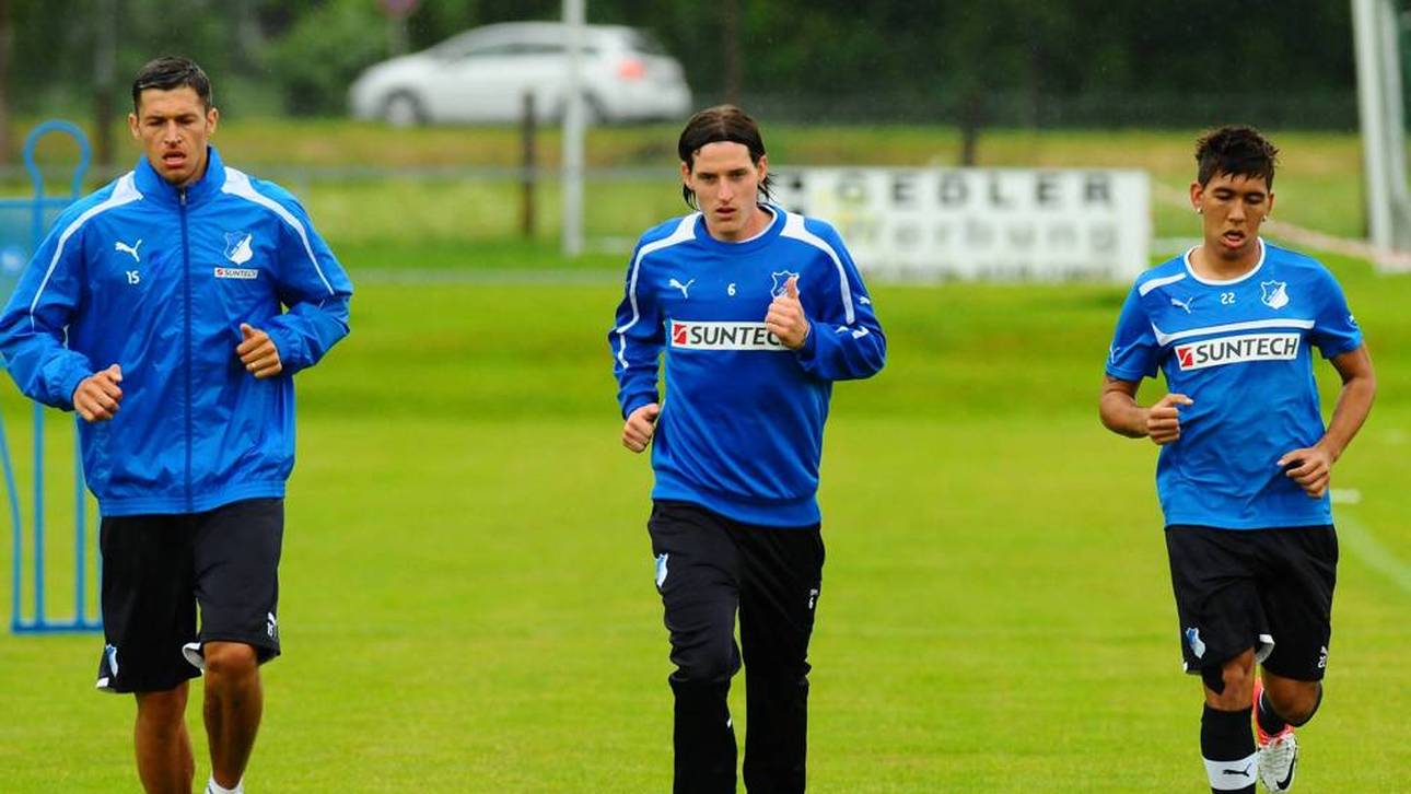 Matthieu Delpierre (links), Sebastian Rudy und Roberto Firmino beim Hoffenheim-Training im Sommer 2012