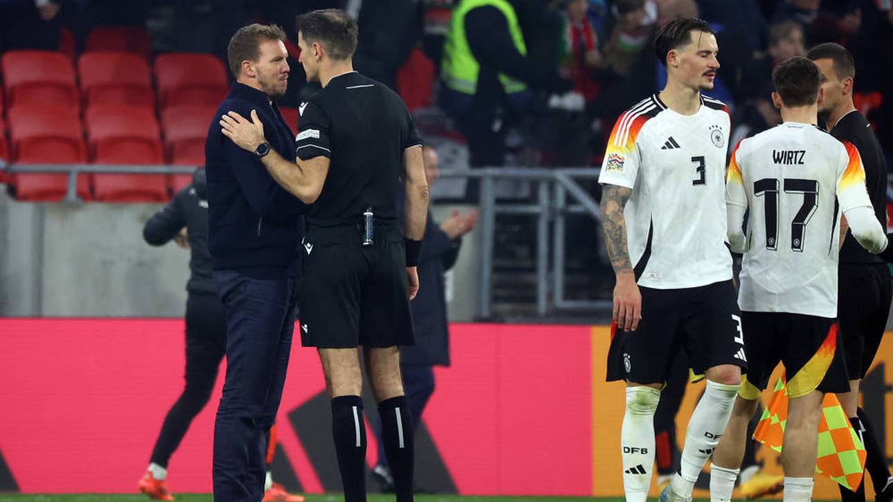 Bundestrainer Julian Nagelsmann (l.) sucht nach dem Remis in Ungarn das Gespräch mit dem Schiedsrichter