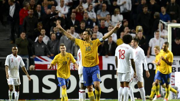 Sweden's striker and team captain Zlatan Ibrahimovic (C) celebrates with his teammates after scoring his 3rd goal of the match during the FIFA World Cup 2014 friendly match England vs Sweden in Stockholm, on November 14, 2012. AFP PHOTO / JONATHAN NACKSTRAND        (Photo credit should read JONATHAN NACKSTRAND/AFP via Getty Images)