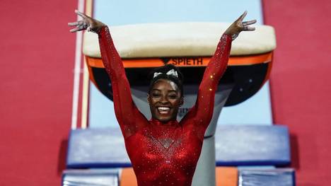 TOPSHOT - USA's Simone Biles reacts after performing on the vault during the apparatus finals at the FIG Artistic Gymnastics World Championships at the Hanns-Martin-Schleyer-Halle in Stuttgart, southern Germany, on October 12, 2019. (Photo by Lionel BONAVENTURE / AFP) (Photo by LIONEL BONAVENTURE/AFP via Getty Images)