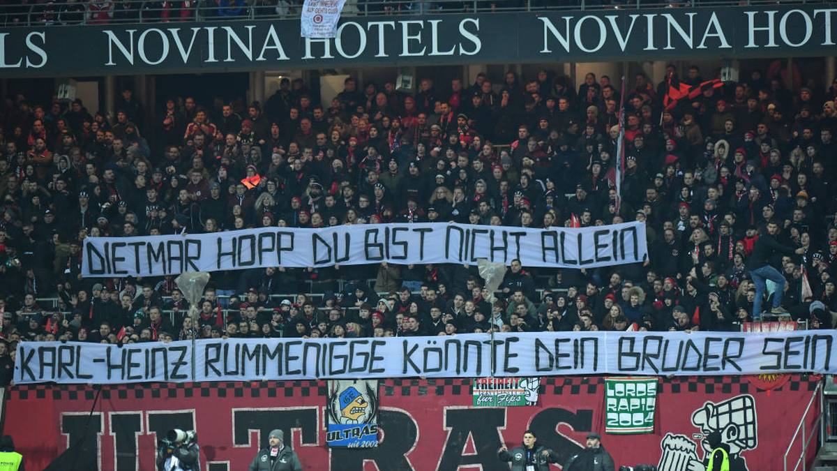 NUREMBERG, GERMANY - MARCH 06: Supporters of Nuernberg hold up a sign that reads "Dietmar Hopp du bist nicht allein, Karl-Heinz Rummenigge könnte dein Bruder sein." (Dietmar Hopp you are not alone, Karl-Heinz Rummenigge could be your brother.) during the Second Bundesliga match between 1. FC Nürnberg and Hannover 96 at Max-Morlock-Stadion on March 06, 2020 in Nuremberg, Germany. (Photo by Sebastian Widmann/Bongarts/Getty Images)