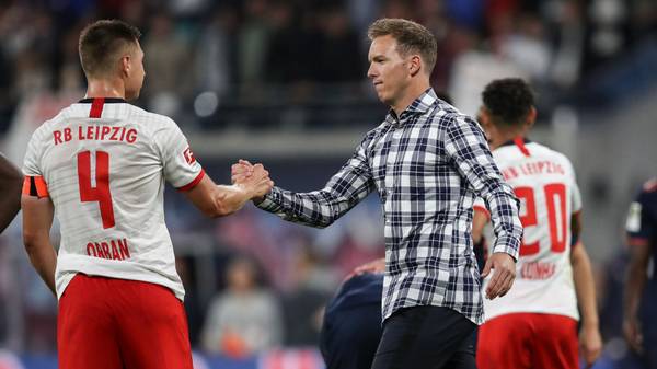 LEIPZIG, GERMANY - SEPTEMBER 14: Julian Nagelsmann head coach of RB Leipzig with Willi Orban of RB Leipzig after the Bundesliga match between RB Leipzig and FC Bayern Muenchen at Red Bull Arena on September 14, 2019 in Leipzig, Germany. (Photo by Maja Hitij/Bongarts/Getty Images)