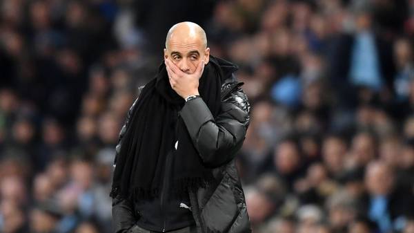 MANCHESTER, ENGLAND - DECEMBER 07: Pep Guardiola, Manager of Manchester City recats during the Premier League match between Manchester City and Manchester United at Etihad Stadium on December 07, 2019 in Manchester, United Kingdom. (Photo by Michael Regan/Getty Images)