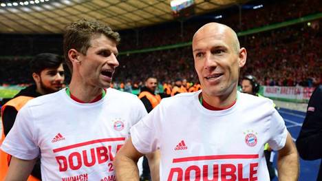 Arjen Robben (r.) spielte zwischen 2009 und 2019 für den FC Bayern