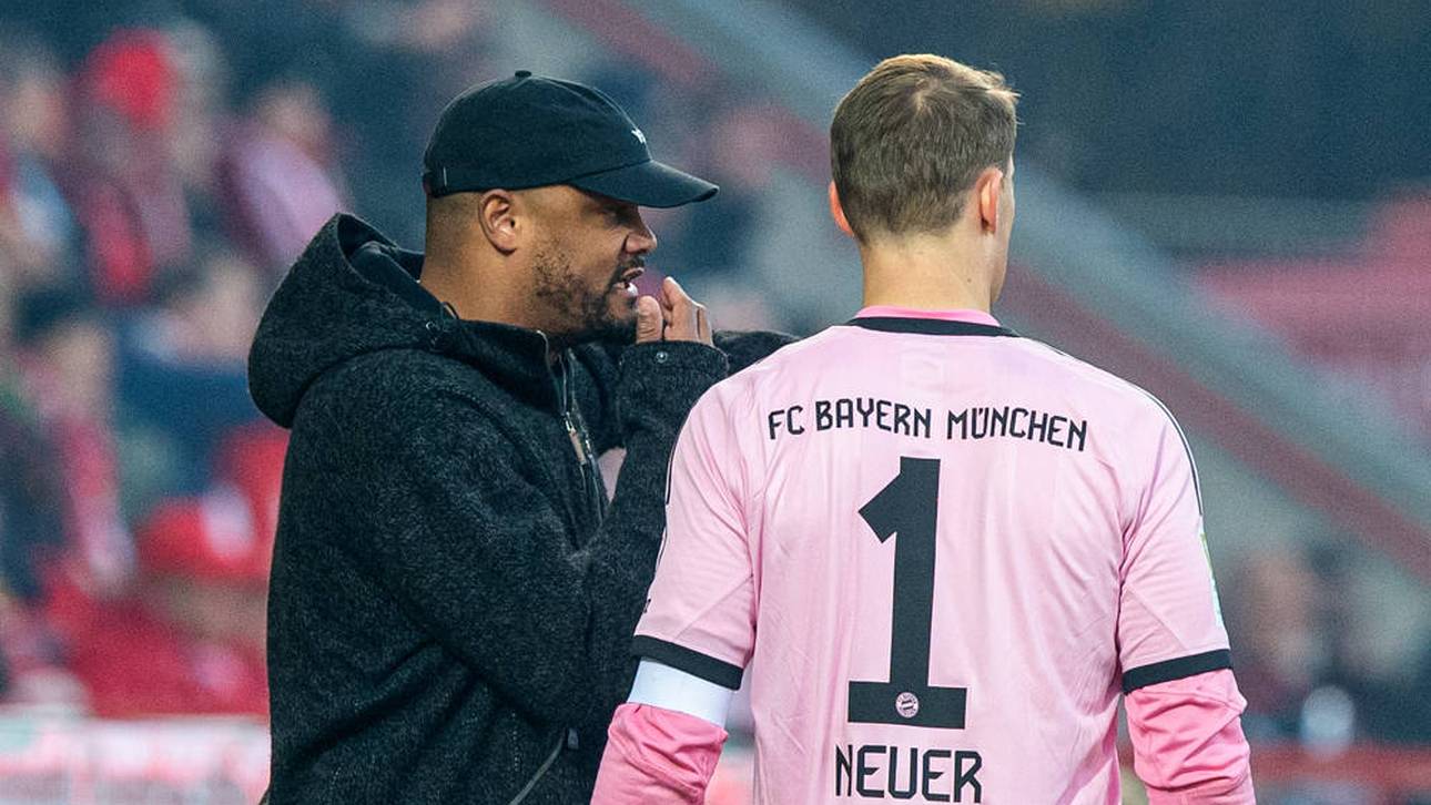 Vincent Kompany im Austausch mit Torhüter Manuel Neuer
