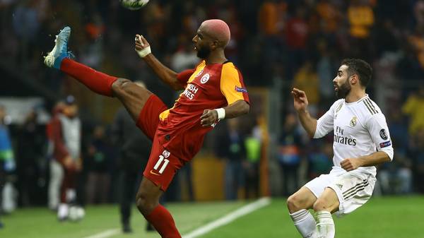 Galatasaray's Dutch forward Ryan Babel (L) controls the baduring the UEFA Champions League group A football match between Galatasaray and Real Madrid on October 22, 2019 at the Ali Sami Yen Spor Kompleksi in Istanbul. (Photo by Gokhan KILICER / AFP) (Photo by GOKHAN KILICER/AFP via Getty Images)