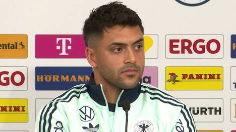 Der belgische Nationalspieler Jeremy Doku wurde für seine Aussage kritisiert, er würde bei der Geburt seines ersten Kindes abreisen. Nadiem Amiri zeigt dafür wenig Verständnis für die Kritik und betont, dass es im Leben Wichtigeres als Fußball gibt.