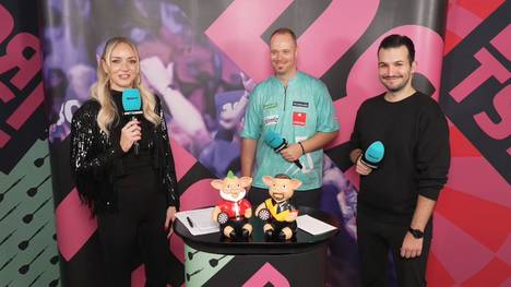 Max Hopp trifft in der zweiten Runde der Darts-WM auf Luke Woodhouse. Obwohl sein englischer Gegner ein "gefährlicher Mann" ist, ist die Stimmung vor dem Duell noch ausgelassen. 