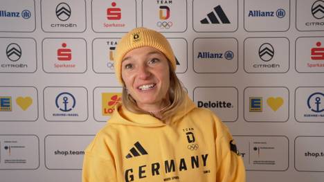 Katharina Schmid hat die Ehre, Deutschland als Fahnenschwenkerin bei den Olympischen Spielen zu führen. Vor der Zeremonie sprach die 29-Jährige über den besonderen Moment und Co-Träger Leon Draisaitl.