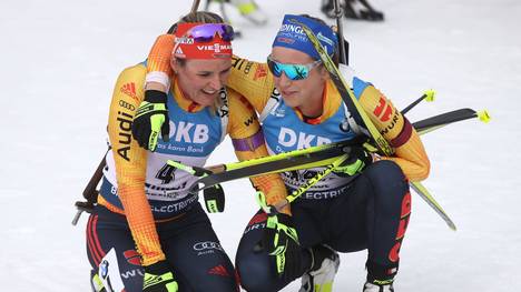 ANTHOLZ-ANTERSELVA, ITALY - FEBRUARY 23: Dennise Herrmann of Germany (L) reacts with her team mate Franziska Preuss (R) at the finish area after the Women 12.5 km Mass Start Competition at the IBU World Championships Biathlon Antholz-Anterselva on February 23, 2020 in Antholz-Anterselva, Italy. (Photo by Alexander Hassenstein/Bongarts/Getty Images)