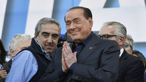 Silvio Berlusconi (r.) war viermal Ministerpräsident in Italien
