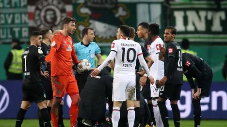 FRANKFURT AM MAIN, GERMANY - MARCH 04: Filip Kostic of Eintracht Frankfurt reacts after receiving a red card during the DFB Cup quarterfinal match between Eintracht Frankfurt and Werder Bremen at Commerzbank Arena on March 04, 2020 in Frankfurt am Main, Germany. (Photo by Alex Grimm/Bongarts/Getty Images)
