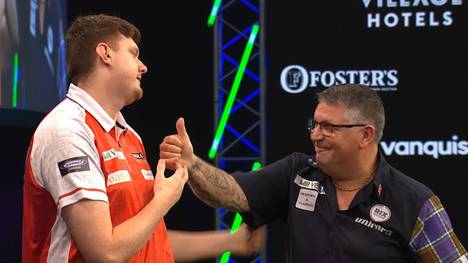 Niko Springer gewinnt sein erstes Gruppenspiel beim Grand Slam of Darts gegen Ex-Weltmeister Gary Anderson und macht einen Schritt in Richtung KO-Phase.