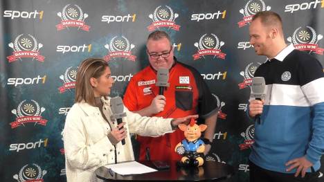 Stephen Bunting sorgt gegen Luke Humphries für eine Überraschung. Im SPORT1 Interview scherzt er dann über einen möglichen Titelgewinn.