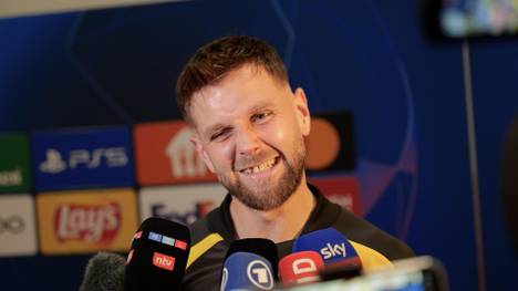 Borussia Dortmund qualifiziert sich mit einem 1:0-Sieg gegen Paris Saint-Germain für die Champions League in der nächsten Saison - ein ungewöhnlicher Weg, wie Niclas Füllkrug und Co. zugeben.