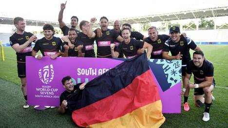 Die deutsche Mannschaft feiert die Teilnahme an der WM