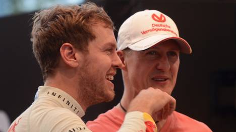 Sebastian Vettel und Michael Schumacher (r.) vor dem Race of Champions 2012