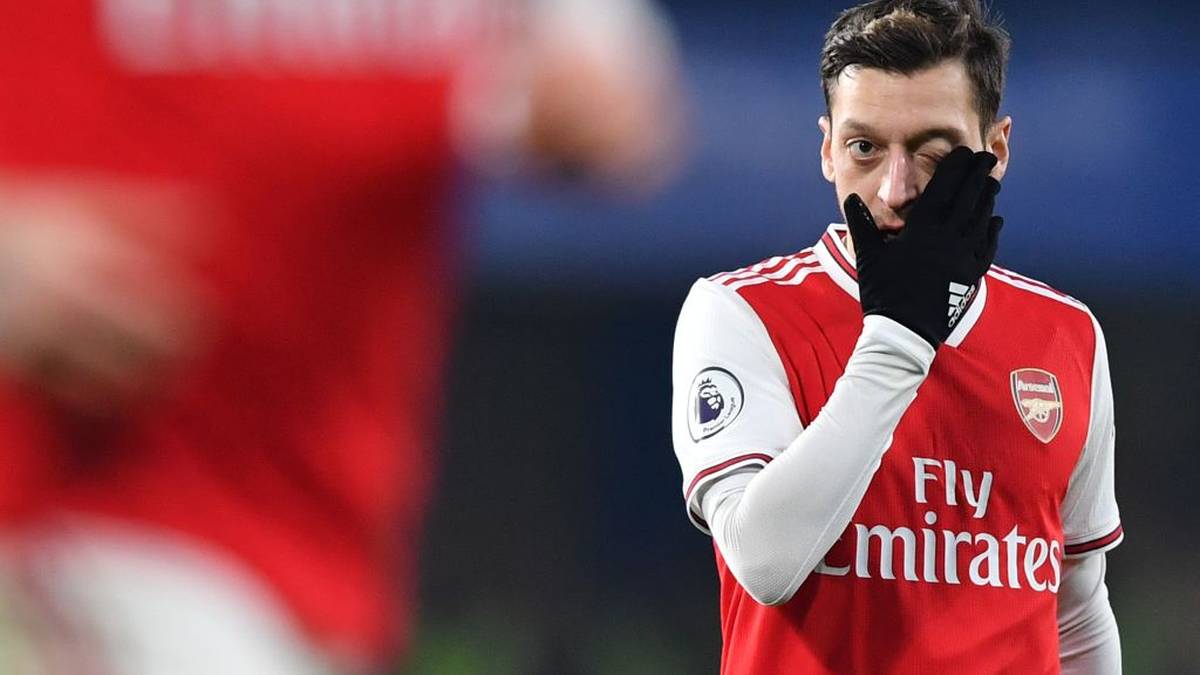 Arsenal's German midfielder Mesut Ozil reacts during the English Premier League football match between Chelsea and Arsenal at Stamford Bridge in London on January 21, 2020. (Photo by Ben STANSALL / AFP) / RESTRICTED TO EDITORIAL USE. No use with unauthorized audio, video, data, fixture lists, club/league logos or 'live' services. Online in-match use limited to 120 images. An additional 40 images may be used in extra time. No video emulation. Social media in-match use limited to 120 images. An additional 40 images may be used in extra time. No use in betting publications, games or single club/league/player publications. /  (Photo by BEN STANSALL/AFP via Getty Images)