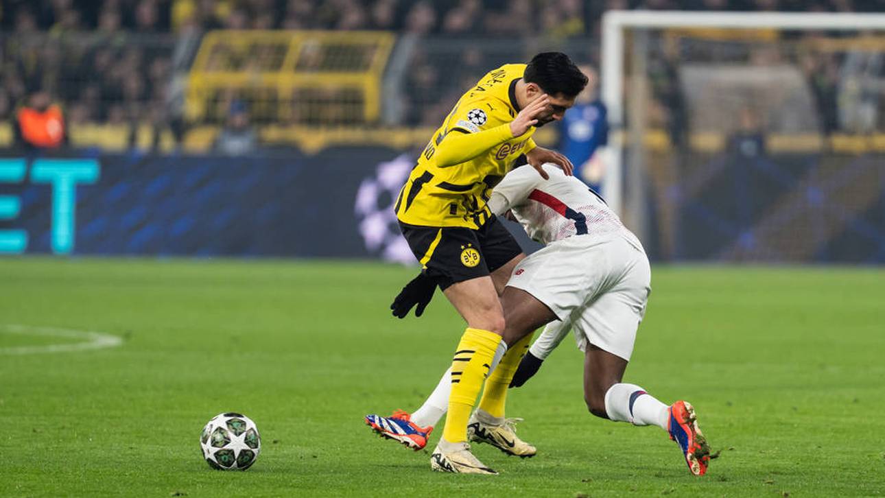 Emre Can (l.) im Duell mit Jonathan David (r.)