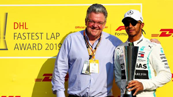 ABU DHABI, UNITED ARAB EMIRATES - DECEMBER 01: Lewis Hamilton of Great Britain and Mercedes GP receives the DHL Fastest Lap award before the F1 Grand Prix of Abu Dhabi at Yas Marina Circuit on December 01, 2019 in Abu Dhabi, United Arab Emirates. (Photo by Dan Istitene/Getty Images)