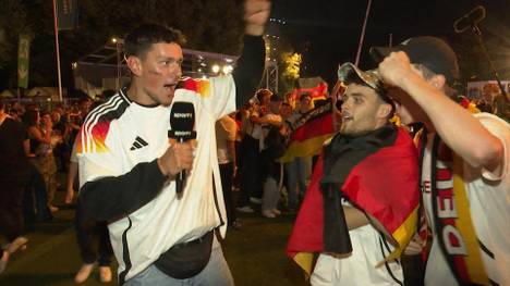 Eine emotionale Achterbahnfahrt auf der Fanmeile vor dem Brandenburger Tor nahm mit dem Gruppensieg für die Deutschland-Fans ein glückliches Ende.