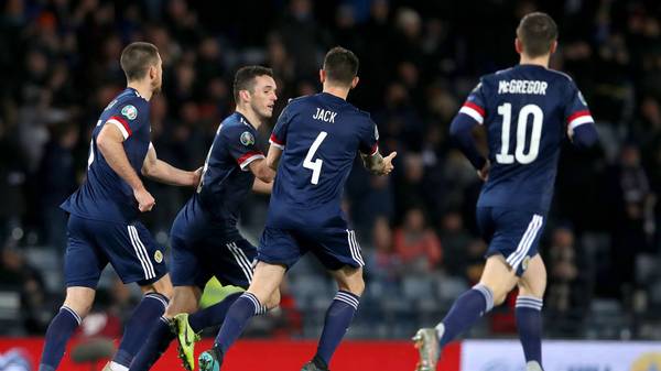GLASGOW, SCOTLAND - NOVEMBER 19: John McGinn of Scotland celebrates after scoring his team's first goal with Ryan Jack during the UEFA Euro 2020 qualifier between Scotland and Kazakhstan at Hampden Park on November 19, 2019 in Glasgow, Scotland. (Photo by Ian MacNicol/Getty Images)