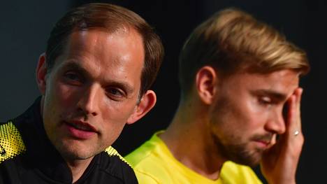 Thomas Tuchel (l.) wird Marcel Schmelzer und Kollegen vor Gericht wiedersehen