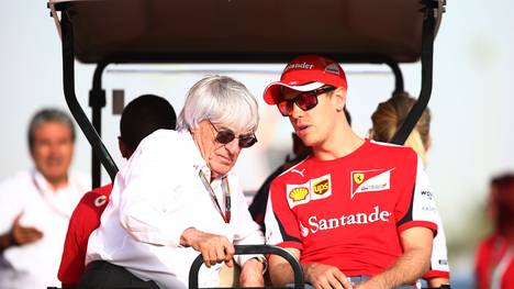 Bernie Ecclestone und Sebastian Vettel im Golfkart