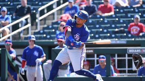 GOODYEAR, ARIZONA - FEBRUARY 24: Willie Calhoun #5 of the Texas Rangers swings at a pitch during the first inning of a spring training game against the Cincinnati Reds at Goodyear Ballpark on February 24, 2020 in Goodyear, Arizona. (Photo by Norm Hall/Getty Images)