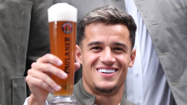 MUNICH, GERMANY - SEPTEMBER 01: Philippe Coutinho of FC Bayern Muenchen poses with a beer mug during the FC Bayern Muenchen and Paulaner photo session at FGV Schmidtle Studios on September 01, 2019 in Munich, Germany. (Photo by Alexandra Beier/Bongarts/Getty Images)