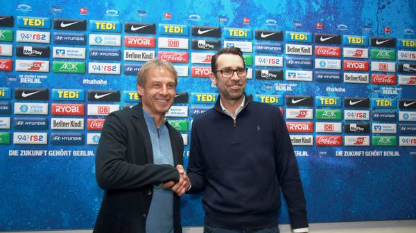 BERLIN, GERMANY - NOVEMBER 27: Juergen Klinsmann, newly appointed head coach of Hertha BSC Berlin, (L) and Manager Michael Preetz pose for the media during a press conference on November 27, 2019 in Berlin, Germany. (Photo by Christian Marquardt/Bongarts/Getty Images)