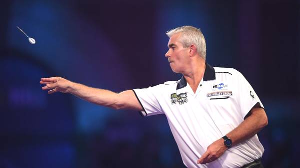 LONDON, ENGLAND - DECEMBER 19: Steve Beaton in action during the round 2 match between  Kyle Anderson and Steve Beaton on Day 7 of the 2020 William Hill World Darts Championship at Alexandra Palace on December 19, 2019 in London, England. (Photo by Alex Davidson/Getty Images)