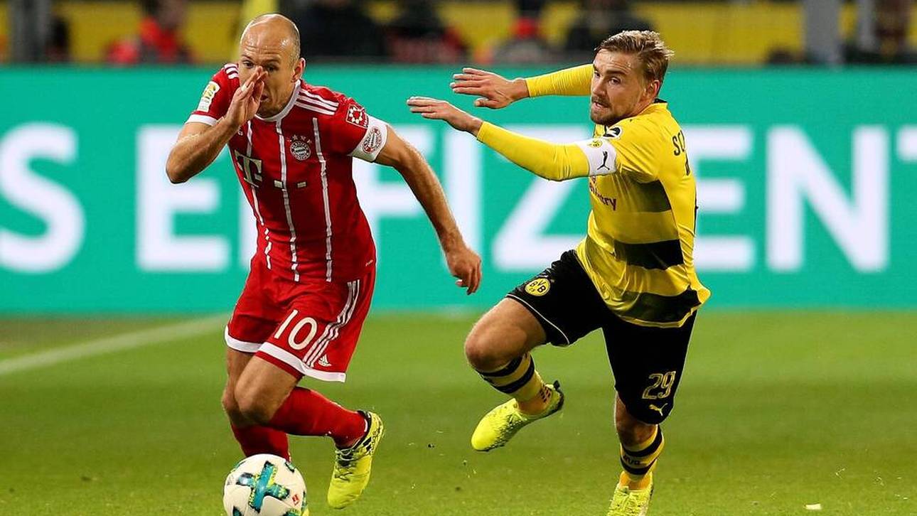 Arjen Robben (l.) und Marcel Schmelzer lieferten sich mehrere packende Duelle