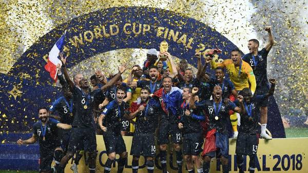 France's players hold their World Cup trophy as they celebrate their win during the trophy ceremony at the end of the Russia 2018 World Cup final football match between France and Croatia at the Luzhniki Stadium in Moscow on July 15, 2018. (Photo by FRANCK FIFE / AFP) / RESTRICTED TO EDITORIAL USE - NO MOBILE PUSH ALERTS/DOWNLOADS        (Photo credit should read FRANCK FIFE/AFP via Getty Images)