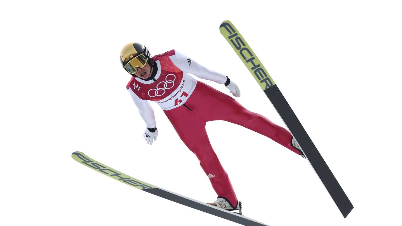 Fahnenträger Frenzel winkt Medaille