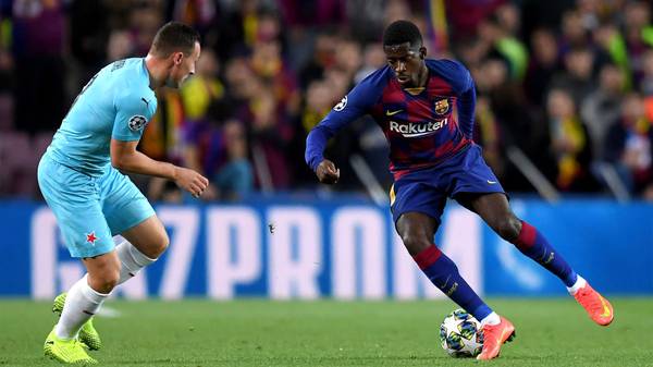 BARCELONA, SPAIN - NOVEMBER 05: Ousmane Dembele of FC Barcelona runs with the ball while challenged by Jan Boril of Slavia Praha during the UEFA Champions League group F match between FC Barcelona and Slavia Praha at Camp Nou on November 05, 2019 in Barcelona, Spain. (Photo by Alex Caparros/Getty Images)