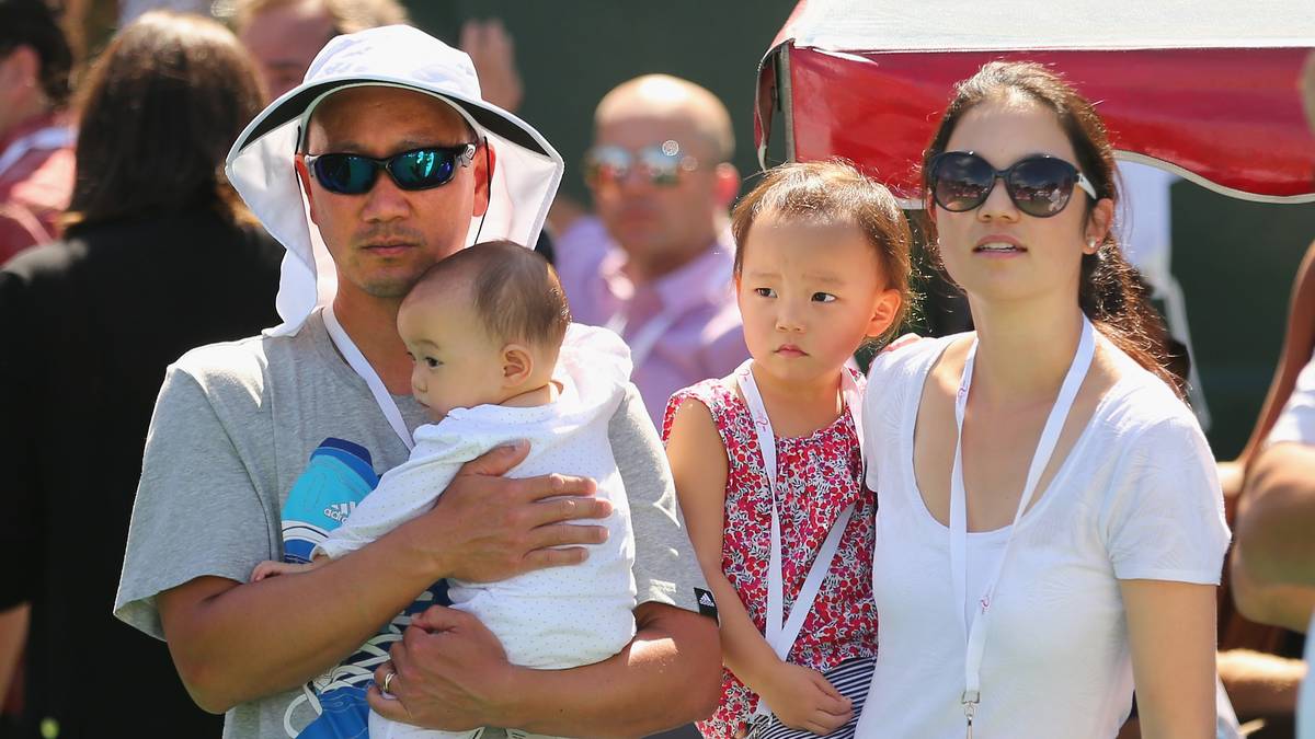 Michael Chang, seine Frau Amber Liu und ihre beiden Töchter 2014