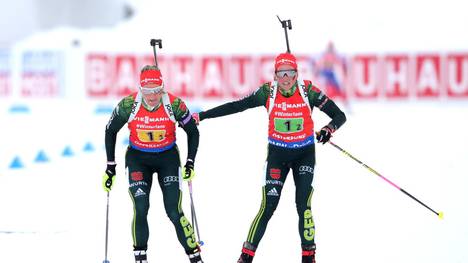OSTERSUND, SWEDEN - MARCH 16: Franziska Hildebrand of Germany hands over to Denise Herrmann of Germany during the Women's 4x6km Relay at the IBU Biathlon World Championships on March 16, 2019 in Ostersund, Sweden. (Photo by Alexander Hassenstein/Bongarts/Getty Images)