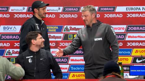 Kölns Trainer Lukas Kwasniok erklärt, warum Ragnar Ache und Marius Bülter so gut harmonieren. Im Anschluss an die PK irritiert ihn die Hose eines Reporters.