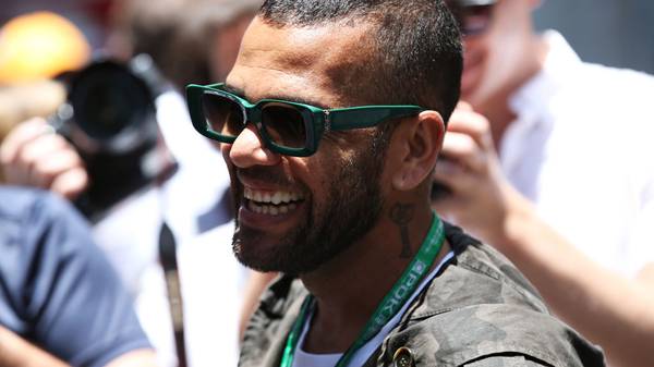 SAO PAULO, BRAZIL - NOVEMBER 17: Footballer Dani Alves looks on in the Paddock before the F1 Grand Prix of Brazil at Autodromo Jose Carlos Pace on November 17, 2019 in Sao Paulo, Brazil. (Photo by Charles Coates/Getty Images)