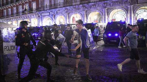 Police clash with Leicester City fans in Madrid