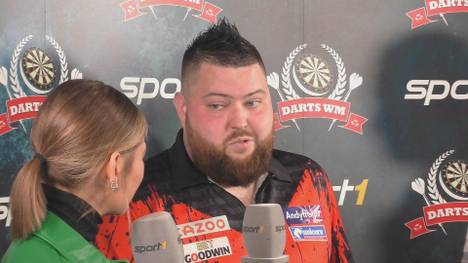 Nach dem Sieg gegen Martin Schindler zeigt sich Michael Smith erleichtert und macht eine Ansage in Richtung Weltmeister-Titel.