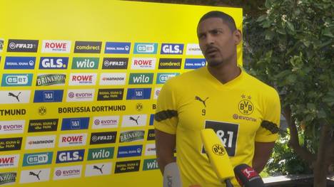 Sébastien Haller ist nach seinem überstandenen Hodenkrebs zurück beim BVB. Jetzt macht der Stürmer eine Kampfansage und gibt eine Prognose für sein Comeback. 