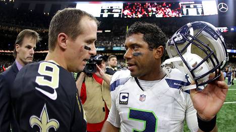 Die Star-Quarterbacks Drew Brees (l.) und Russell Wilson sind in der Sache vereint