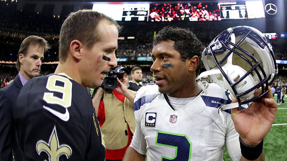 Die Star-Quarterbacks Drew Brees (l.) und Russell Wilson sind in der Sache vereint