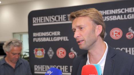 Bayer Leverkusen steht vor einer Leihe von Manchester Citys Talent Claudio Echeverri. Sport-Geschäftsführer Simon Rolfes erklärt beim Rheinischen Fußballgipfel die Konkurrenzsituation mit Borussia Dortmund.