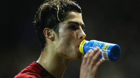 Cristano Ronaldo of Manchester United takes a drink