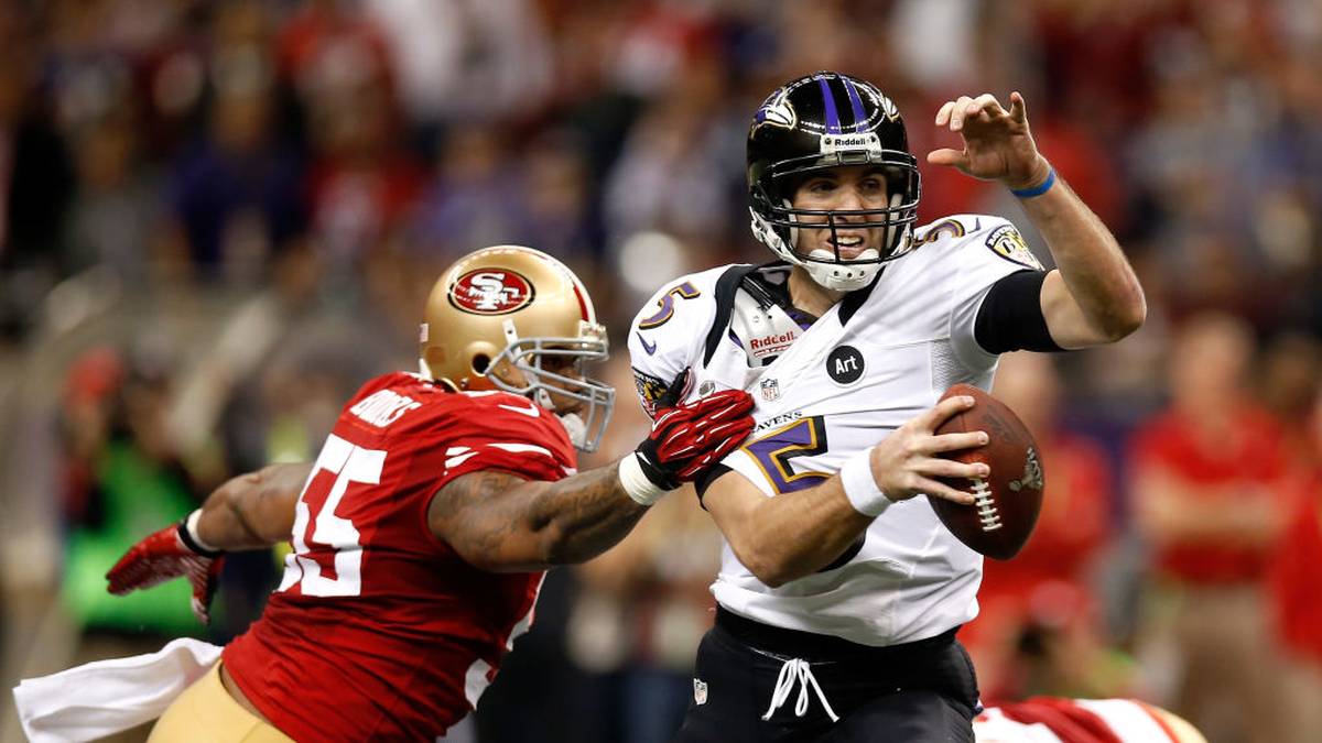 NEW ORLEANS, LA - FEBRUARY 03:  Joe Flacco #5 of the Baltimore Ravens attempts to escape a pass rush by Ahmad Brooks #55 of the San Francisco 49ers during Super Bowl XLVII at the Mercedes-Benz Superdome on February 3, 2013 in New Orleans, Louisiana. The Ravens won 34-31. (Photo by Chris Graythen/Getty Images) 