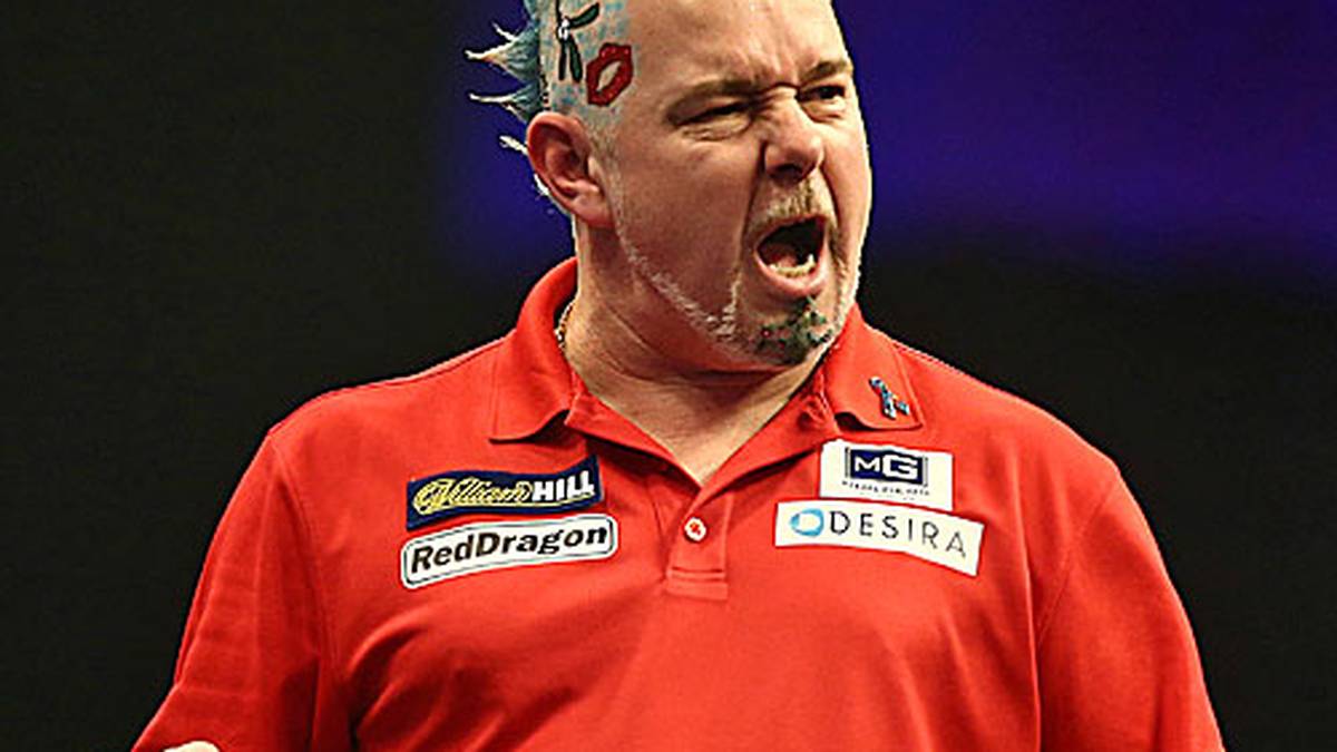 Und einen bunteren Vogel als Peter Wright scheint es auch kaum zu geben. Der Vorjahresfinalist fällt nicht nur sportlich, sondern auch optisch auf. So sieht er in Runde 1 aus, als er...